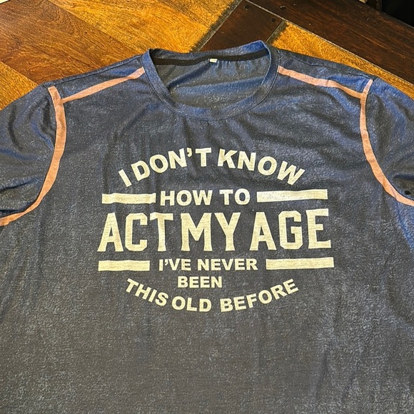T shirt with aging slogan. Size XL. - Picture 1 of 5